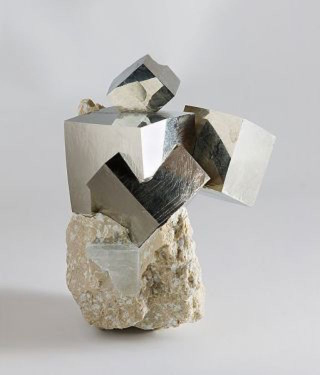 Illustration for article titled This Chunk Of Fool's Gold Naturally Formed In These Cubes